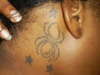 Spider and stars tattoo
