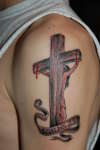 Unique Cross tattoo
