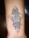 cross wtth lilies tattoo