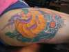 pumpkin/skull tattoo