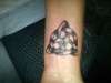 wrist tattoo trinity tattoo