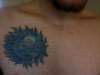 Blue sun tattoo