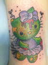 Morbid Hello Kitty tattoo