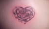 heart shaped rose tattoo