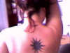 Upper back tattoo