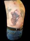 john wayne on ribs tattoo