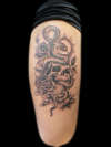 skull and snake tattoo