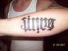 Sinner/Saint Ambigram tattoo