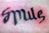 Smile - ambirgram tattoo