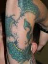 more of dragon wrap around tattoo