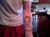 my sons portrait tattoo