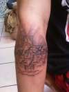 JOHNNIE'S ARM tattoo