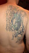 Terrible Backpiece before coverup tattoo