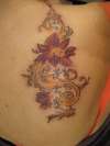 flower/symbols tattoo