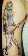 guitar chick tattoo