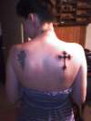 jess's cross tattoo