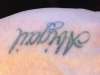 my daughters name on left hand tattoo