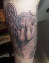 religious angel tattoo black and grey
