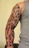 skin cheese full sleeve tattoo