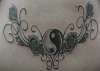 yin yan n roses tattoo