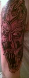 demond face tattoo