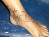 freehand foot tribal tattoo