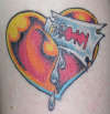 heart & razer tattoo
