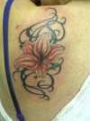 lily and swirls tattoo