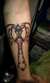 tribal cross tattoo