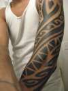 3/4 tribal sleeve tattoo