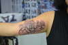 Custom rose and music tattoo