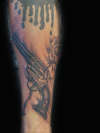 gun & rose tattoo