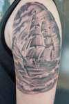 Black and Grey Ship tattoo