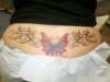 Lower back butterfly tattoo