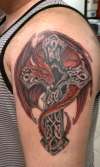 Red Dragon on a Celtic Cross (coverup) tattoo