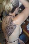 Angel wings Side shot tattoo