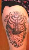 Sailboat thigh peice tattoo