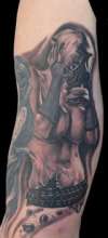 Woman with gas mask tattoo