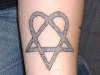 stone heartagram tattoo