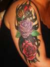 large floral and tribal design tattoo