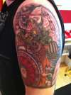 top arm tattoo