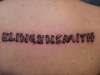 wooden name tattoo