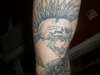 Exploited skull tattoo