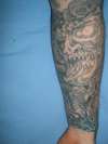 Medusa looking demon tattoo