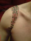broken shoulder front tattoo