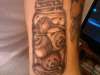 eyeballs in jar tattoo