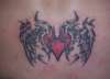 start of lower back tatt tattoo