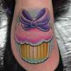 Cupcake tattoo on foot by Craig Holmes