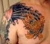 Japanese wave and Lion fish tattoo