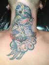 adams apple tattoo